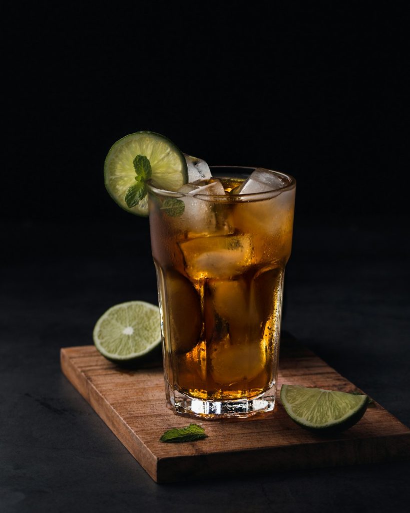Traditional Moroccan mint tea in glass teapot with fresh mint leaves